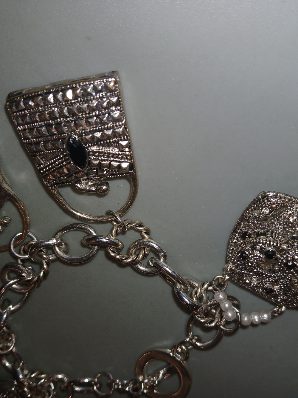 Silver-Tone Filigree Charm Bracelet with Pearls and Black Stone Accents